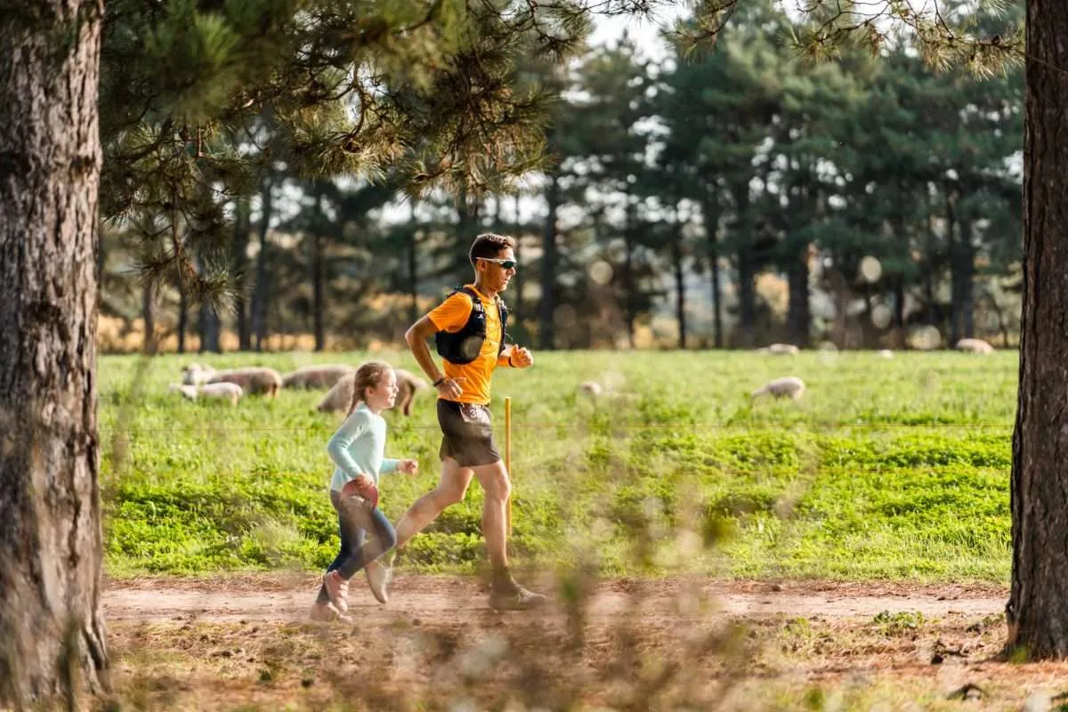 My daughter running with me as I finish a 50k ultra